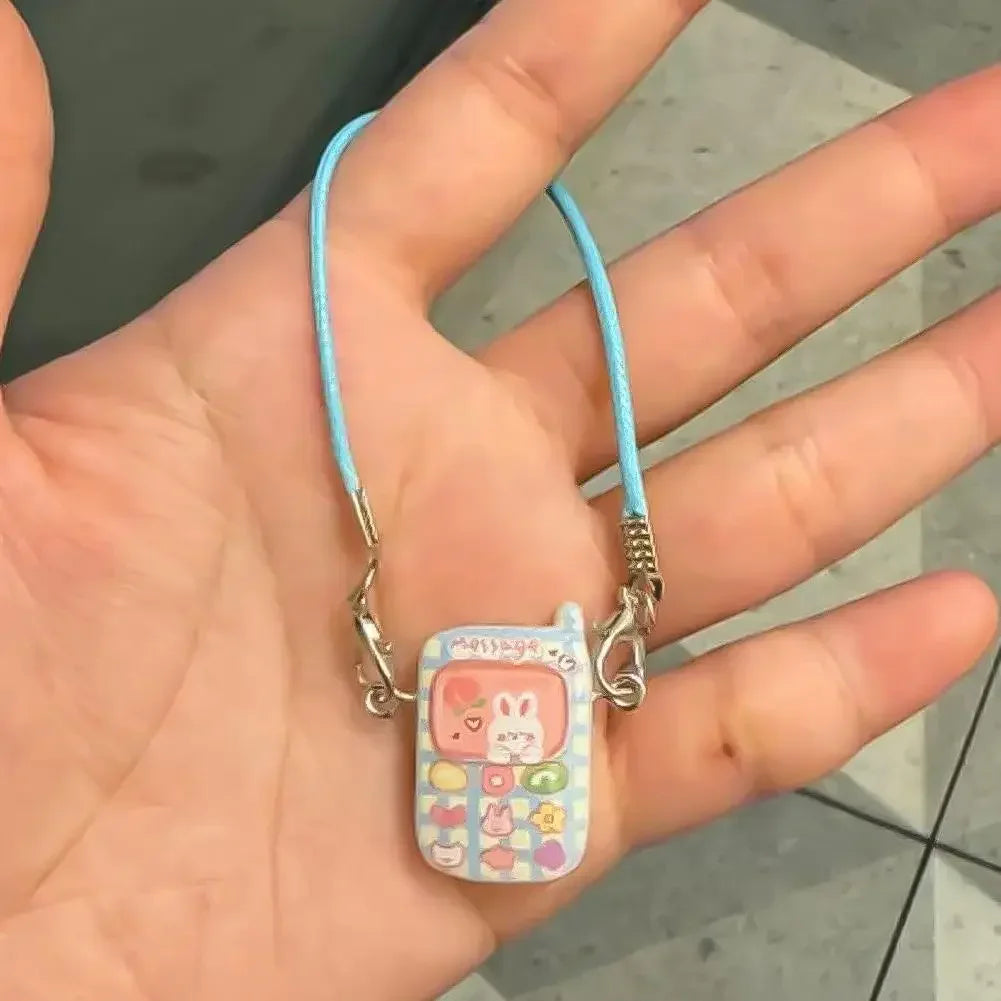 📱 Pendentif Mini Cartoon Labubu – L’accessoire qui fait toute la différence !