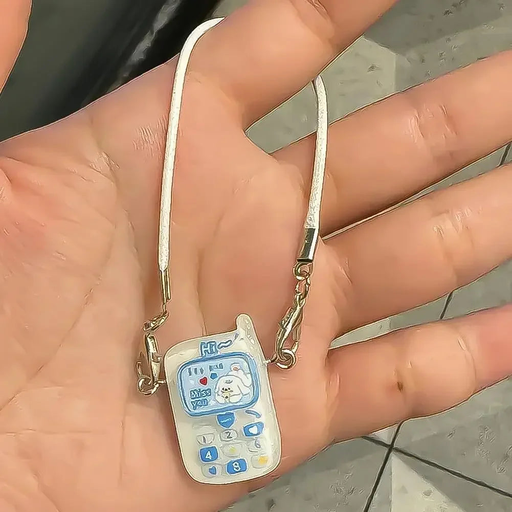 📱 Pendentif Mini Cartoon Labubu – L’accessoire qui fait toute la différence !