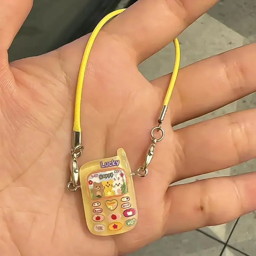 📱 Pendentif Mini Cartoon Labubu – L’accessoire qui fait toute la différence !