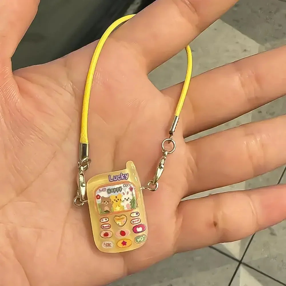 📱 Pendentif Mini Cartoon Labubu – L’accessoire qui fait toute la différence !