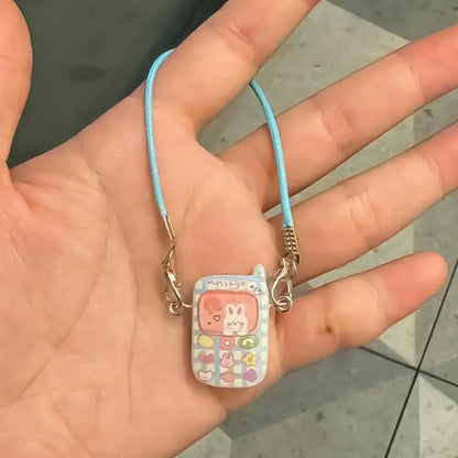 📱 Pendentif Mini Cartoon Labubu – L’accessoire qui fait toute la différence !
